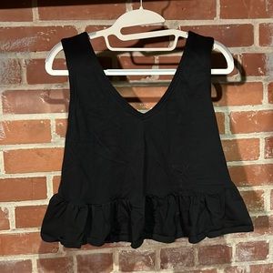 Soft, wild fable crop with ruffle